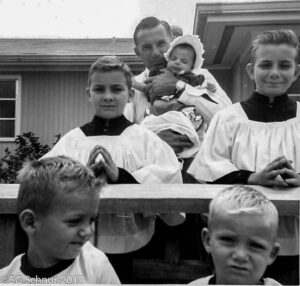 Baptism of Lori Caye with Snuffy holding the baby and Steven and Keven as Servers and Gil and Wray standing in front.