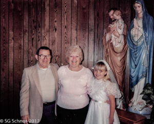 Snuffy and Darlene with their granddaughter Tammy's First Communion